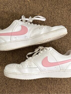 Nike White Sneakers with Pink Swoosh Accent